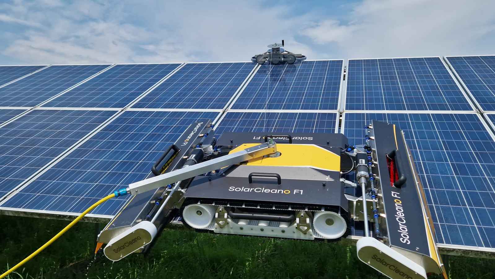 Robotic washing of solar panels